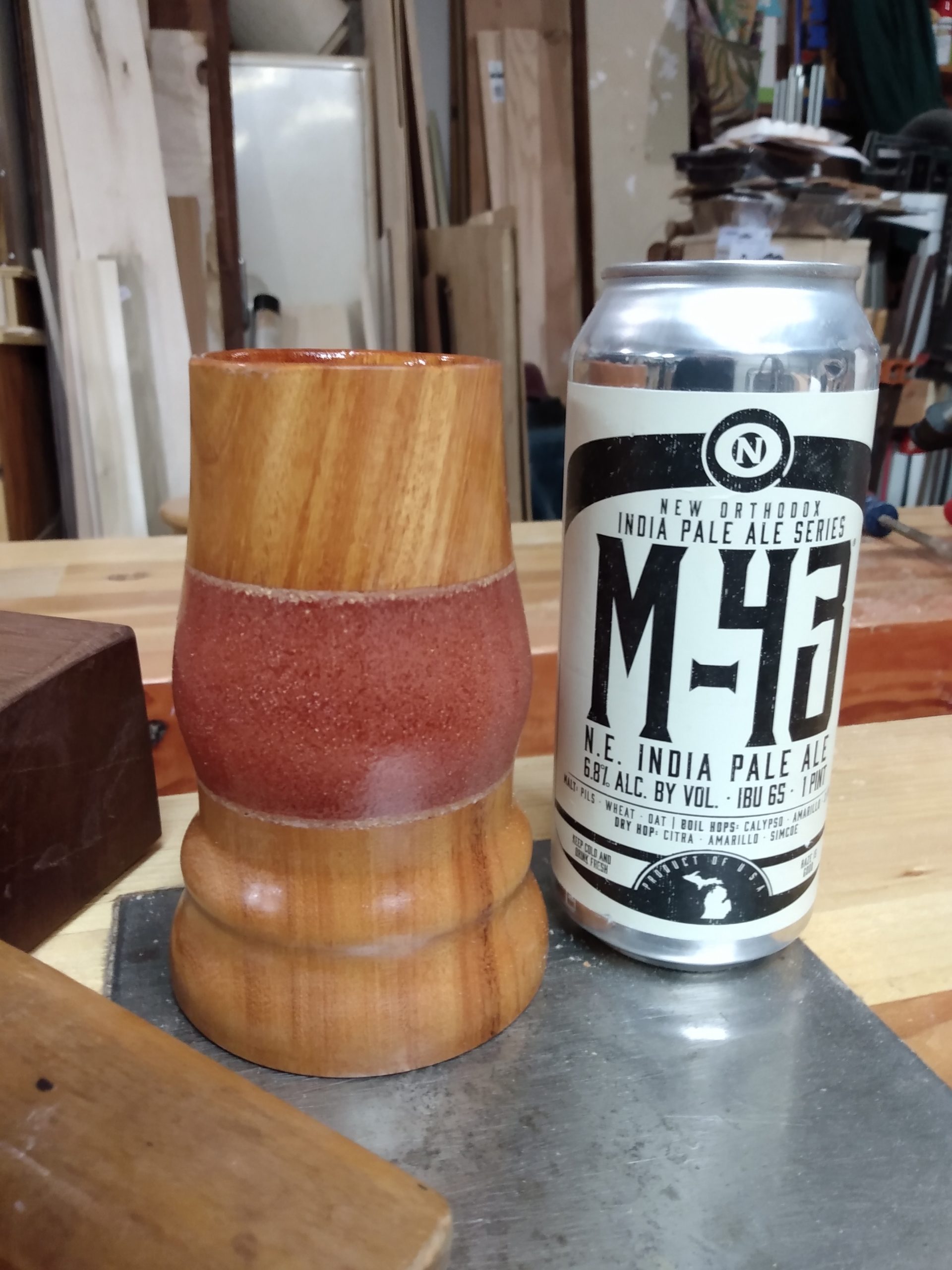 Wood Cup and a Can of Beer