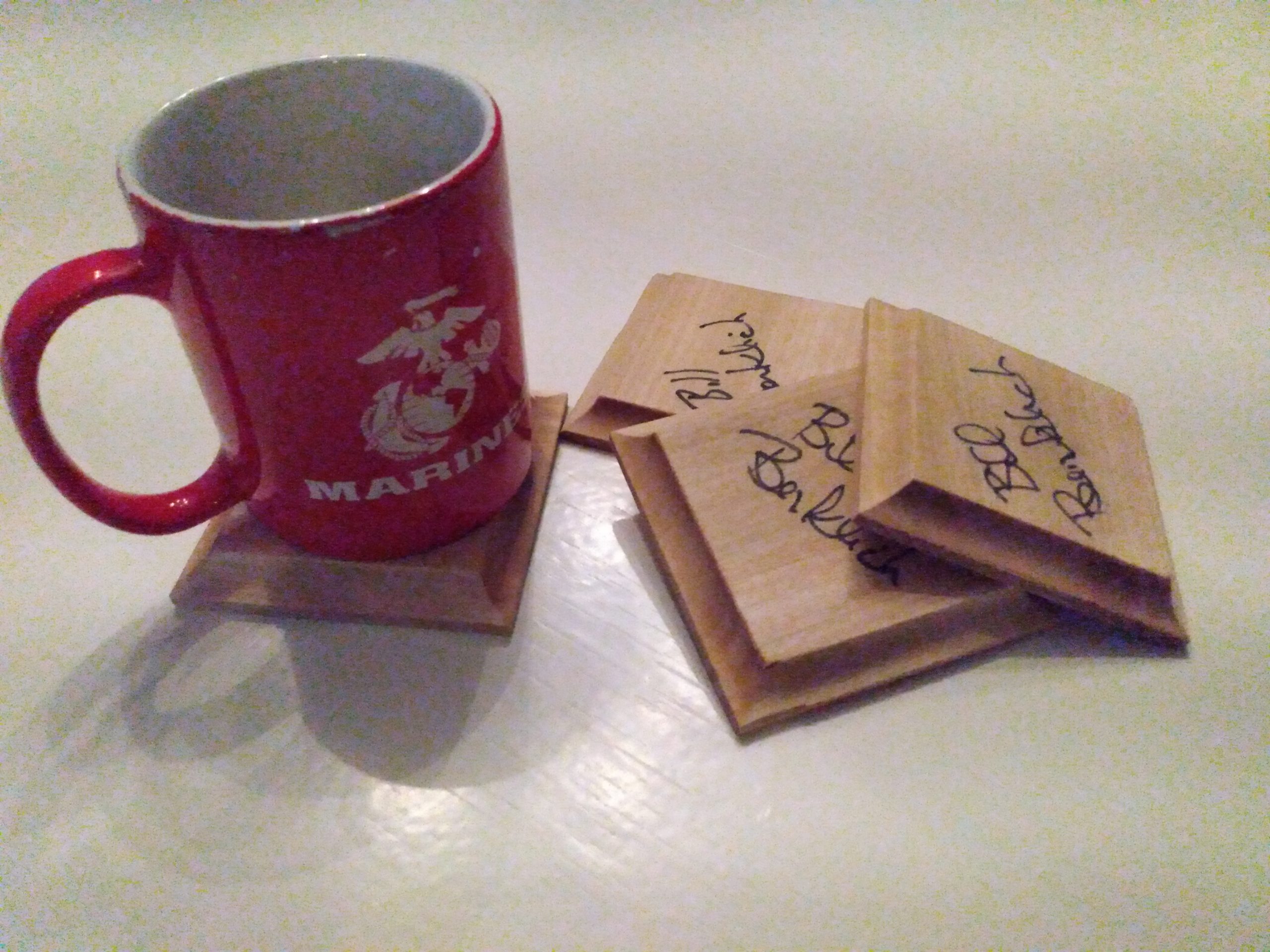 Coasters and coffee cup